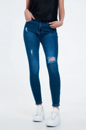 Distressed skinny fit jeans in mid wash